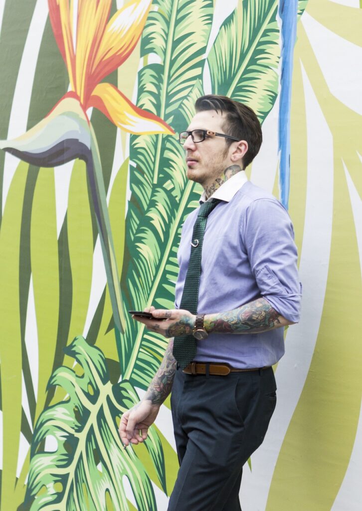 New jobs_young tattoed man in tie